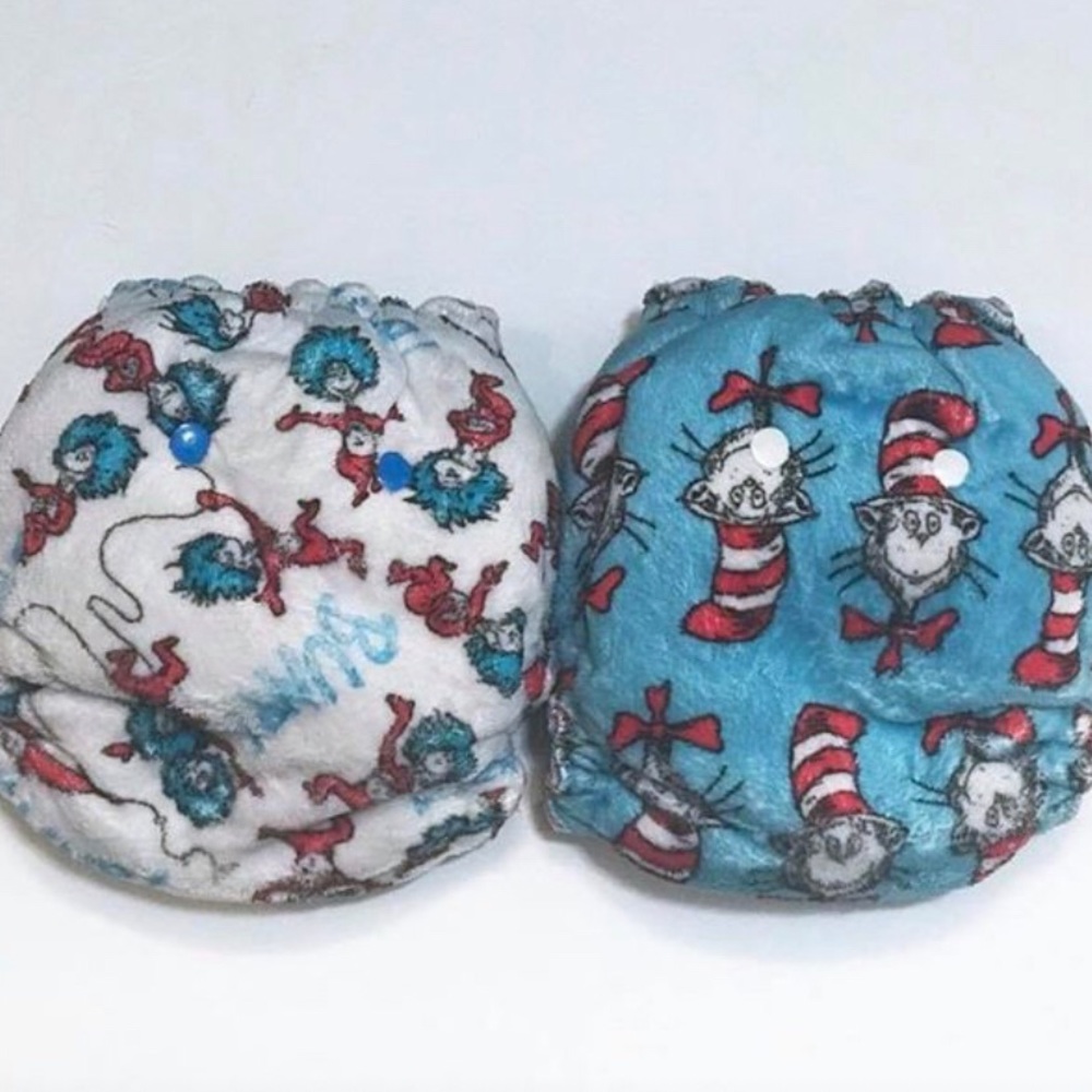 Two WAHM Dr. Seuss cloth diapers.